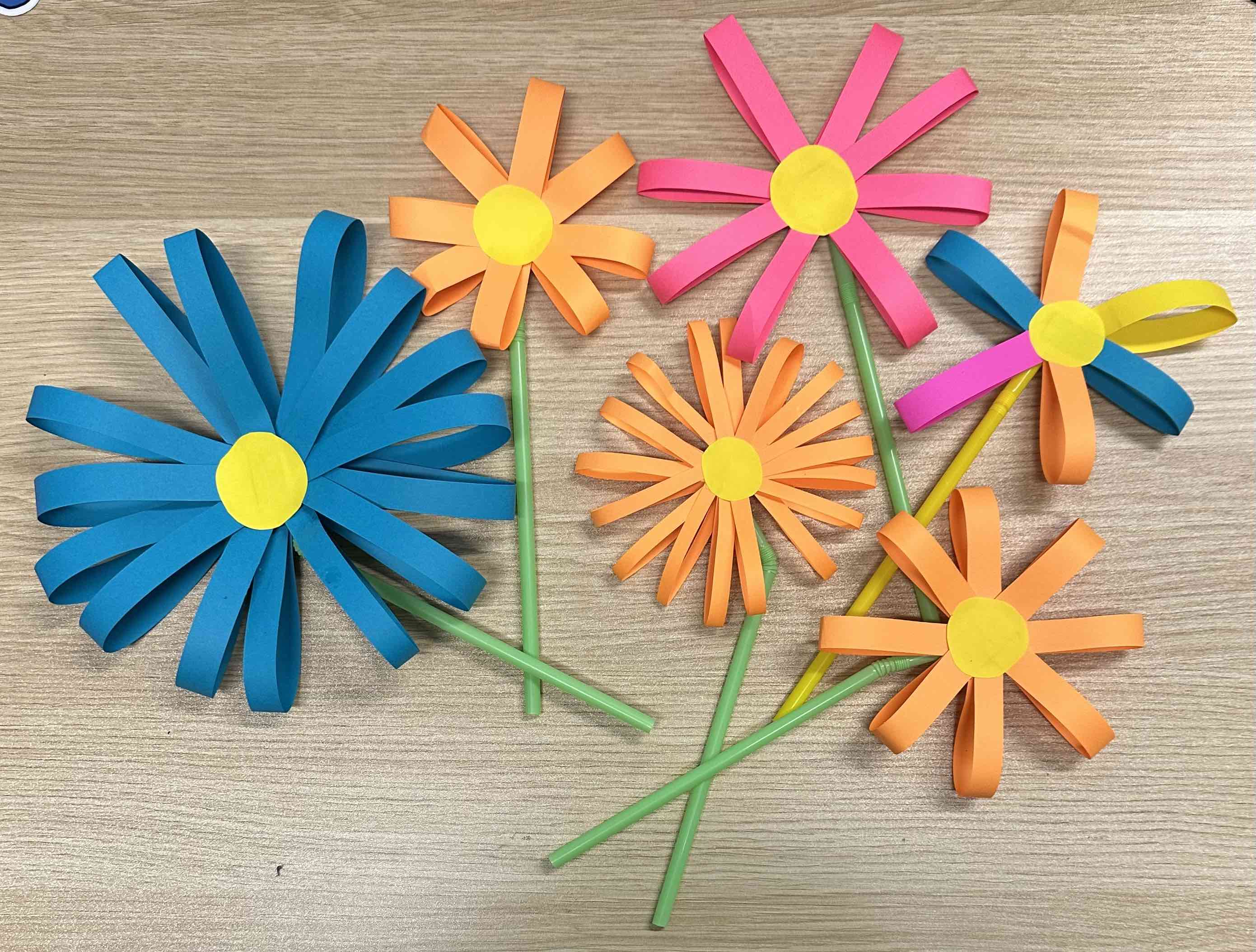 paper flowers photo of a bunch of colorful paper flowers