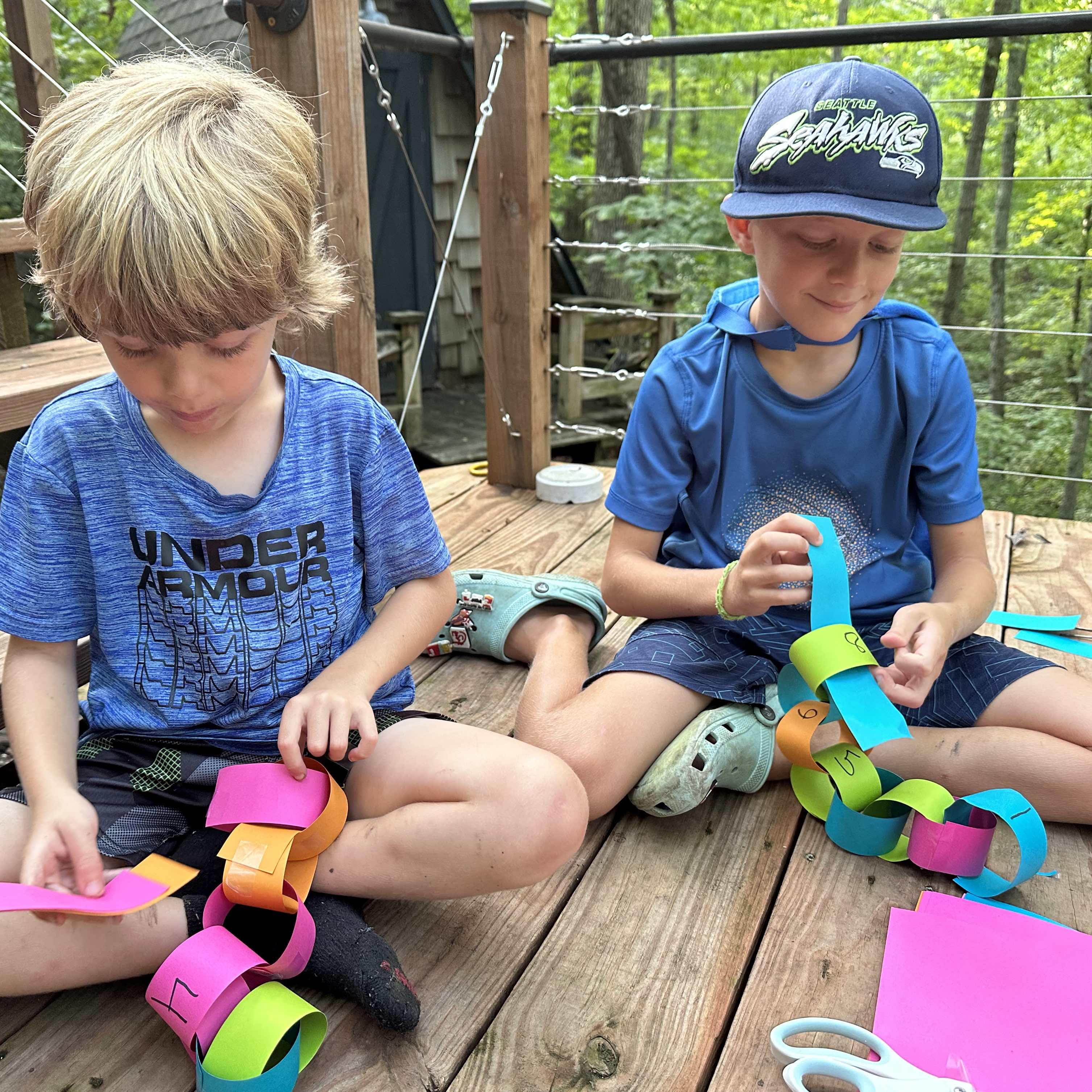boys making countdown chains